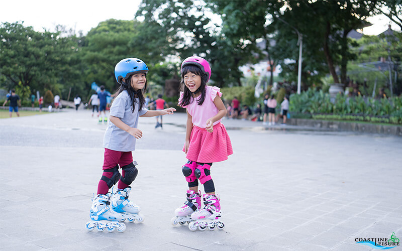 Kids learning roller blades at east coast park Singapore