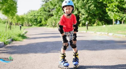 Asian boy learning to skate