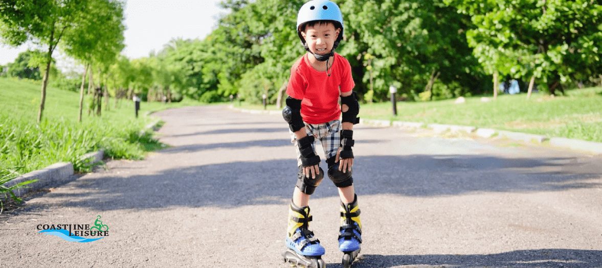 Asian boy learning to skate