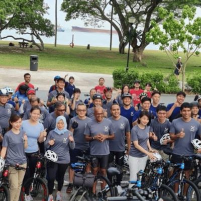 A group of people gathered for cycling event