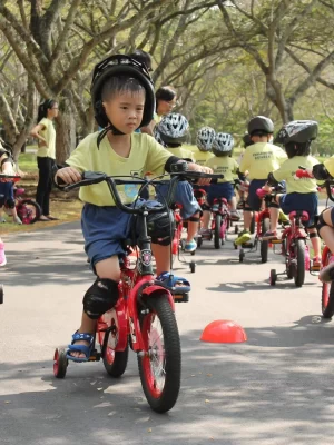 A toddler learning to cycle