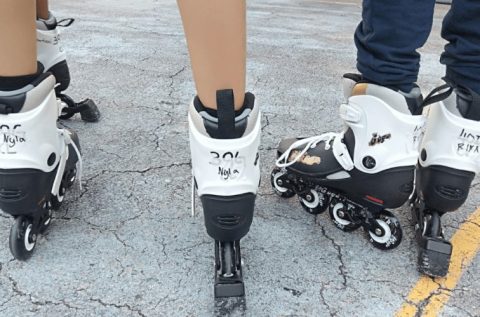 2 people wearing White skating shoes