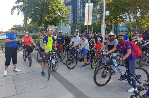 Group of cyclists posing for a photograph